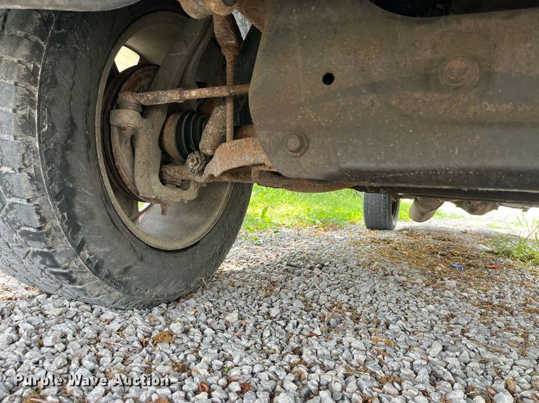 image for item DP0512 2004 Dodge Ram 1500  Quad Cab flatbed pickup truck