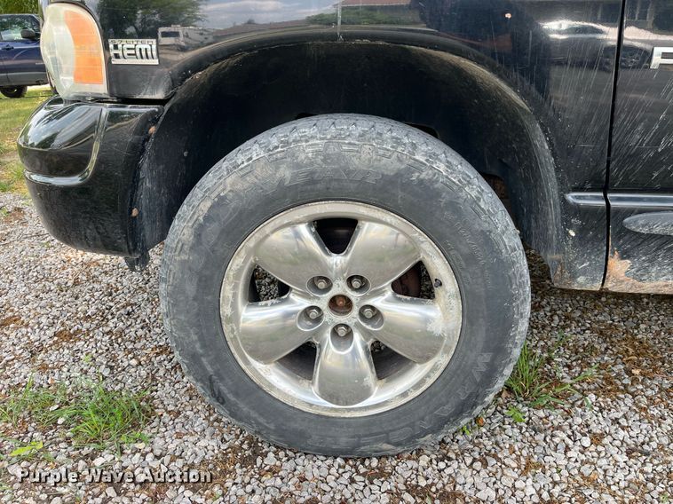 image for item DP0512 2004 Dodge Ram 1500  Quad Cab flatbed pickup truck