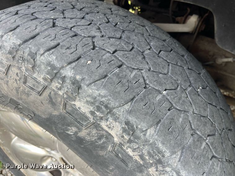 image for item DP0512 2004 Dodge Ram 1500  Quad Cab flatbed pickup truck