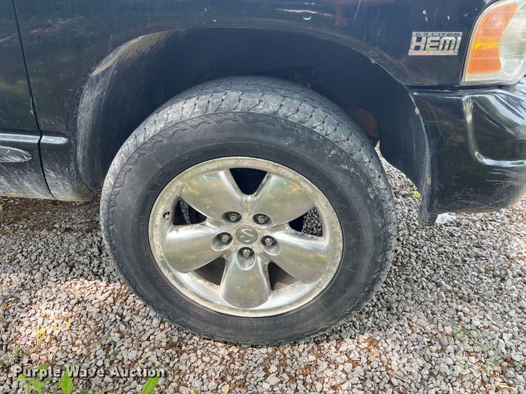 image for item DP0512 2004 Dodge Ram 1500  Quad Cab flatbed pickup truck