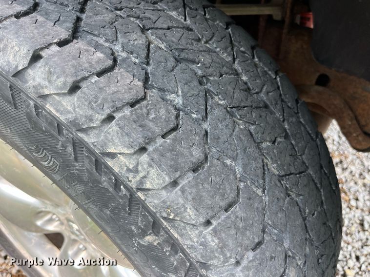 image for item DP0512 2004 Dodge Ram 1500  Quad Cab flatbed pickup truck