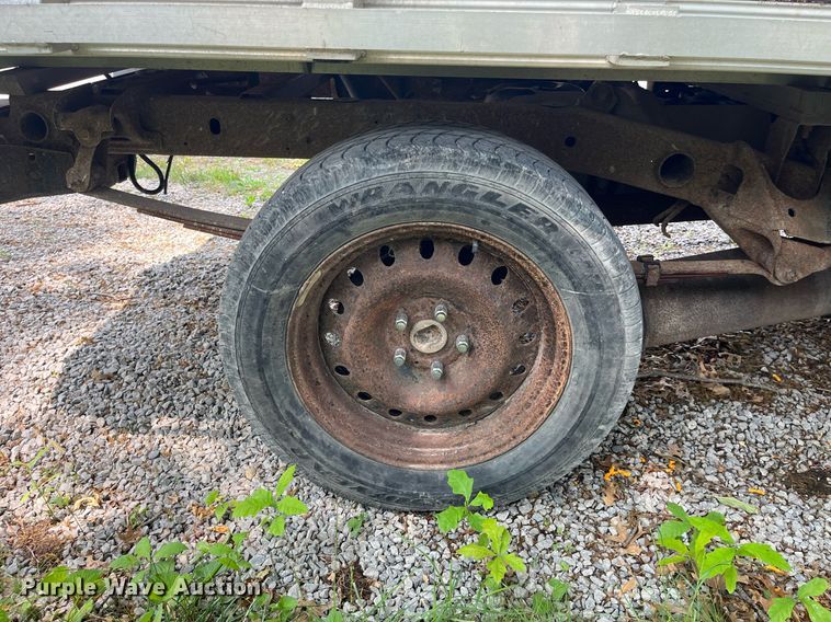 image for item DP0512 2004 Dodge Ram 1500  Quad Cab flatbed pickup truck