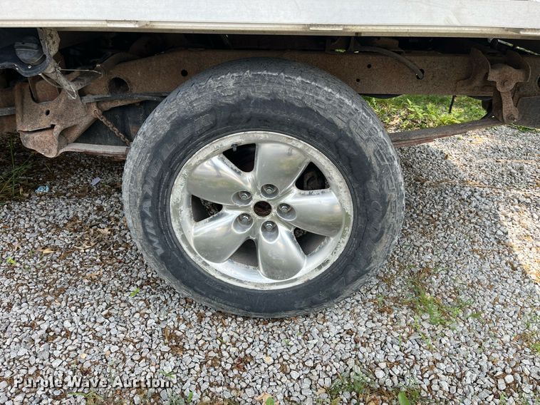 image for item DP0512 2004 Dodge Ram 1500  Quad Cab flatbed pickup truck