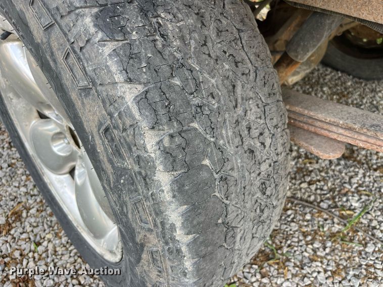 image for item DP0512 2004 Dodge Ram 1500  Quad Cab flatbed pickup truck