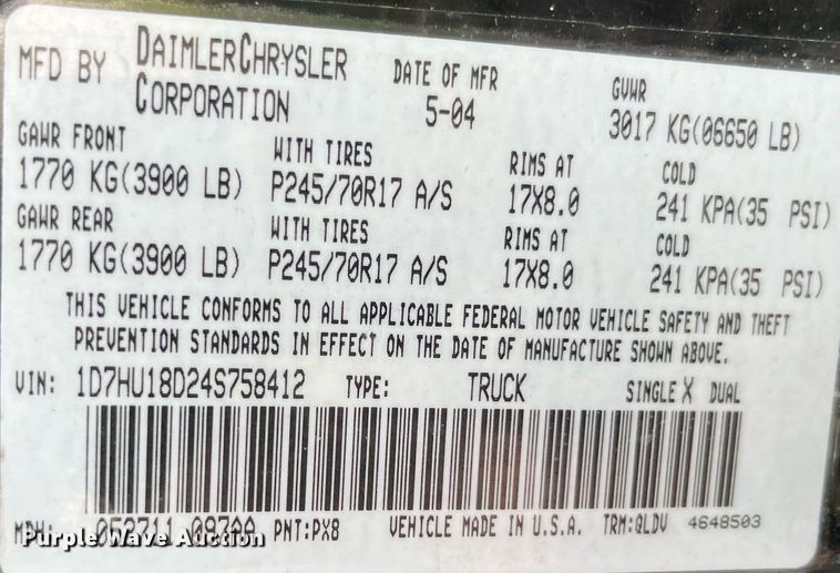 image for item DP0512 2004 Dodge Ram 1500  Quad Cab flatbed pickup truck