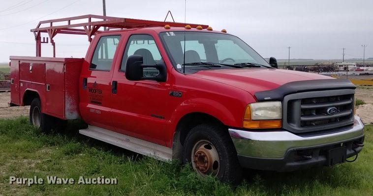 image for item DP3293 2000 Ford  F350 Super Duty XL  Crew Cab utility bed pickup truck