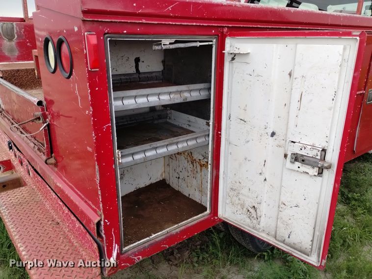 image for item DP3293 2000 Ford  F350 Super Duty XL  Crew Cab utility bed pickup truck