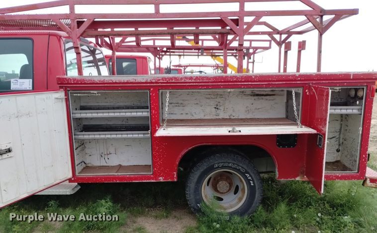 image for item DP3293 2000 Ford  F350 Super Duty XL  Crew Cab utility bed pickup truck