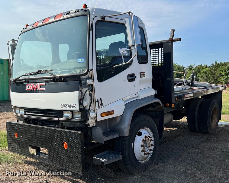 image for item DQ2085 2002 GMC T6500  flatbed truck