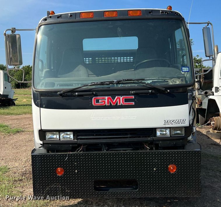 image for item DQ2085 2002 GMC T6500  flatbed truck
