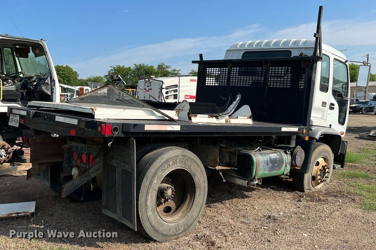 image for item DQ2085 2002 GMC T6500  flatbed truck