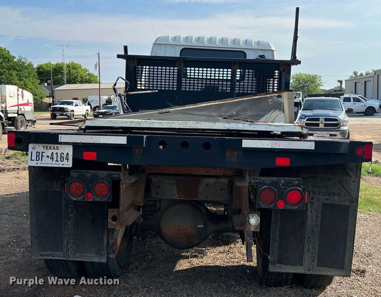 image for item DQ2085 2002 GMC T6500  flatbed truck