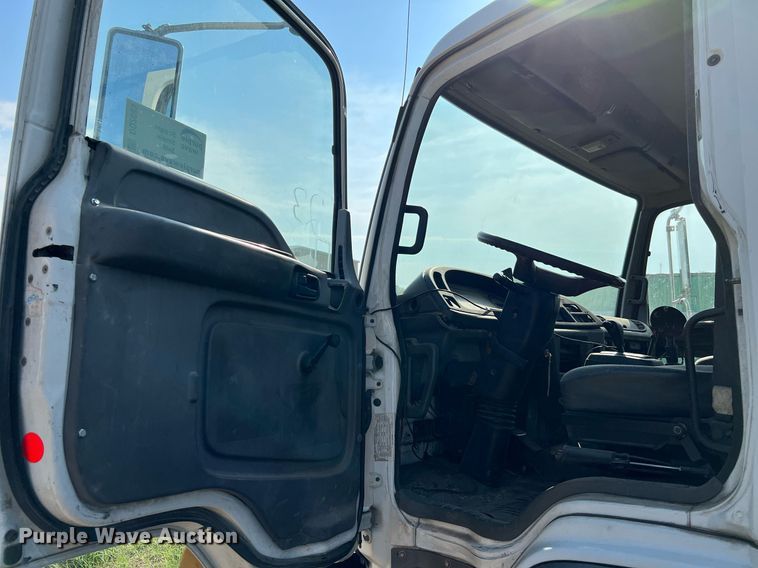 image for item DQ2085 2002 GMC T6500  flatbed truck