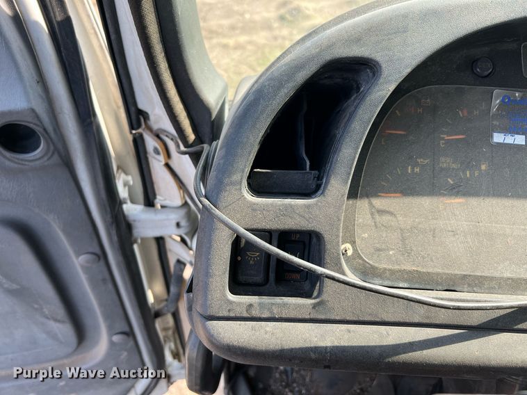 image for item DQ2085 2002 GMC T6500  flatbed truck