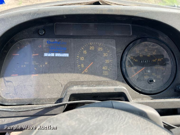 image for item DQ2085 2002 GMC T6500  flatbed truck