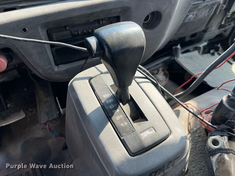 image for item DQ2085 2002 GMC T6500  flatbed truck