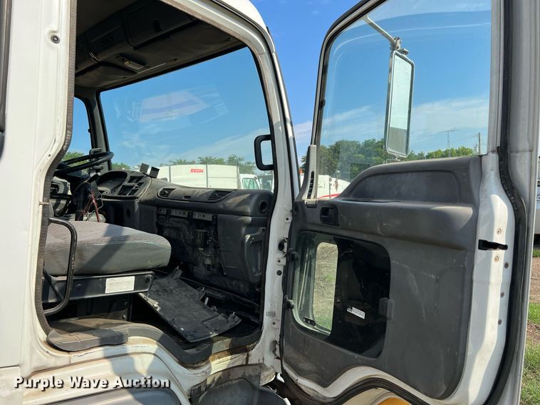 image for item DQ2085 2002 GMC T6500  flatbed truck