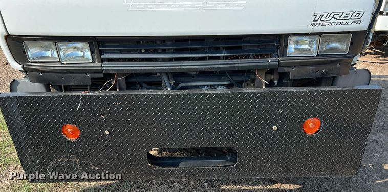 image for item DQ2085 2002 GMC T6500  flatbed truck