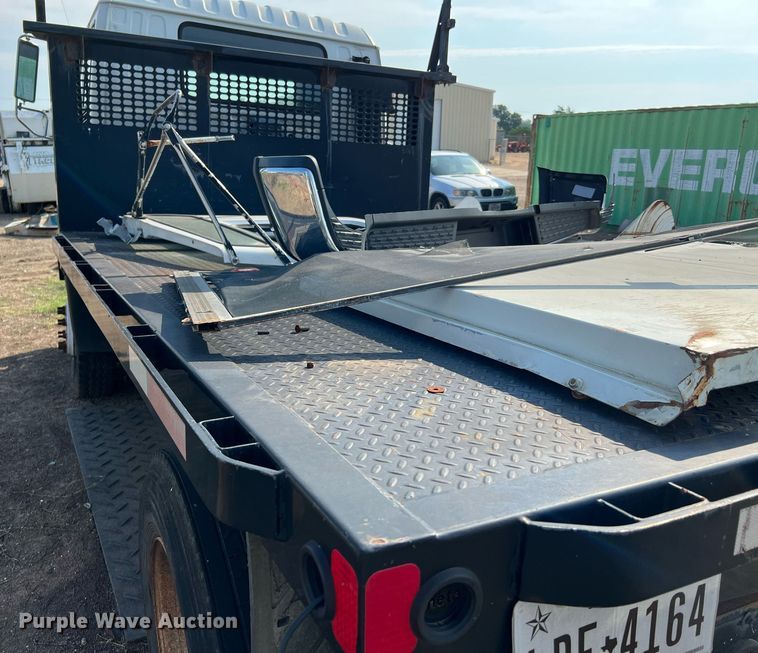 image for item DQ2085 2002 GMC T6500  flatbed truck