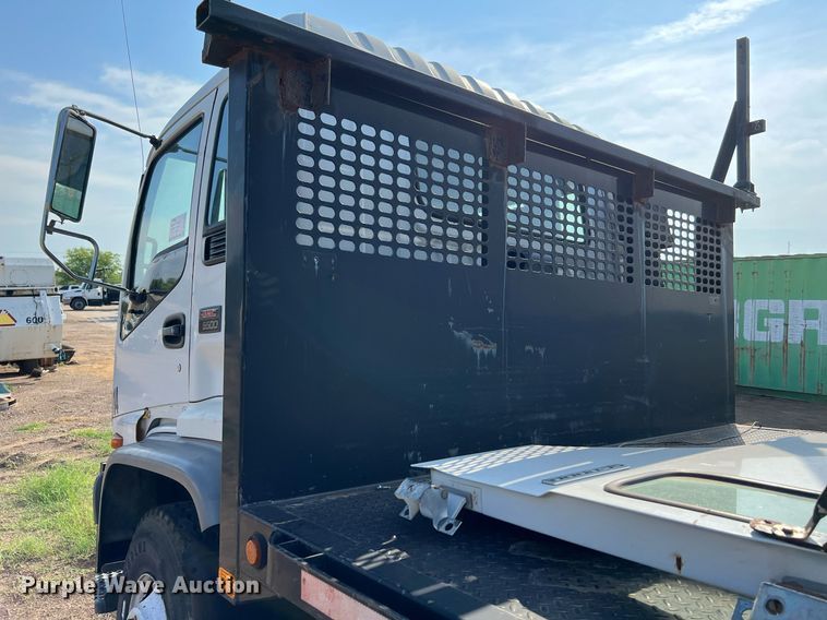 image for item DQ2085 2002 GMC T6500  flatbed truck