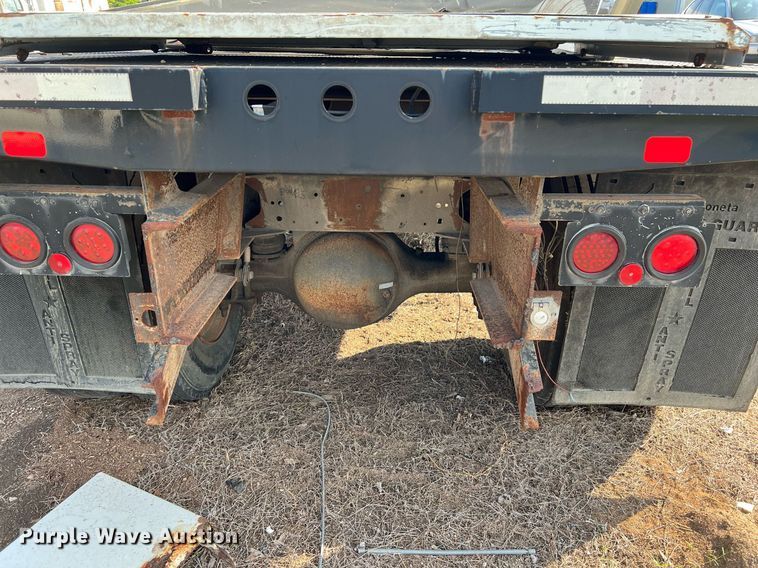 image for item DQ2085 2002 GMC T6500  flatbed truck