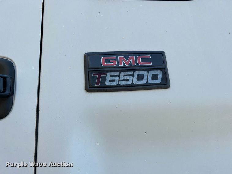 image for item DQ2085 2002 GMC T6500  flatbed truck