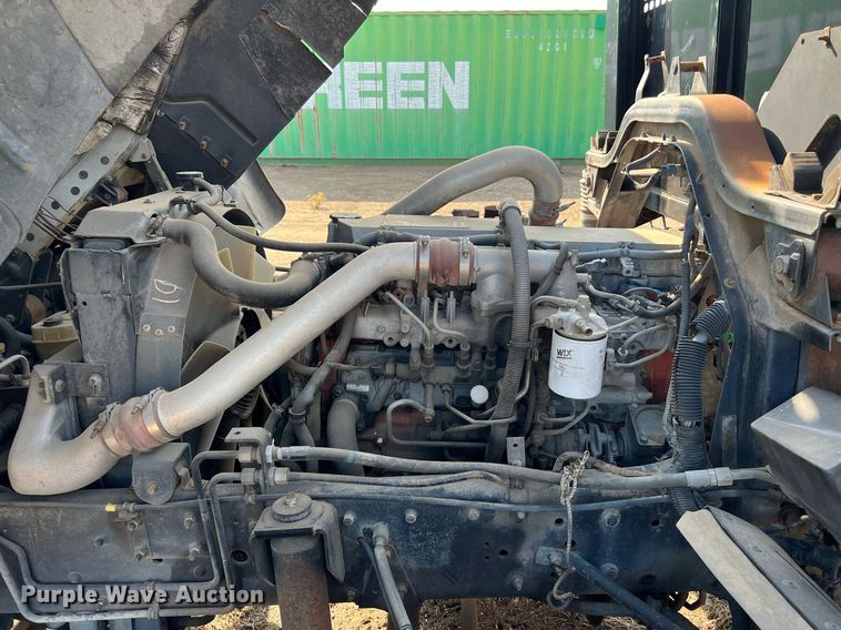 image for item DQ2085 2002 GMC T6500  flatbed truck