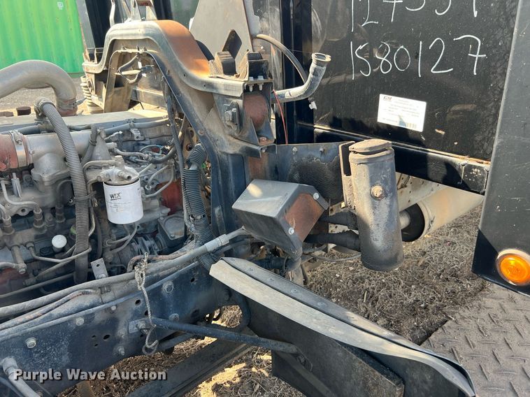 image for item DQ2085 2002 GMC T6500  flatbed truck