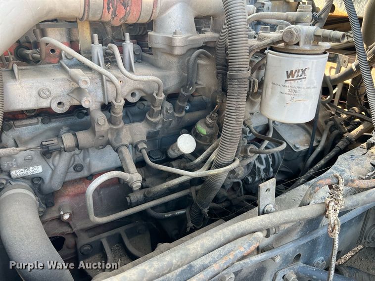 image for item DQ2085 2002 GMC T6500  flatbed truck