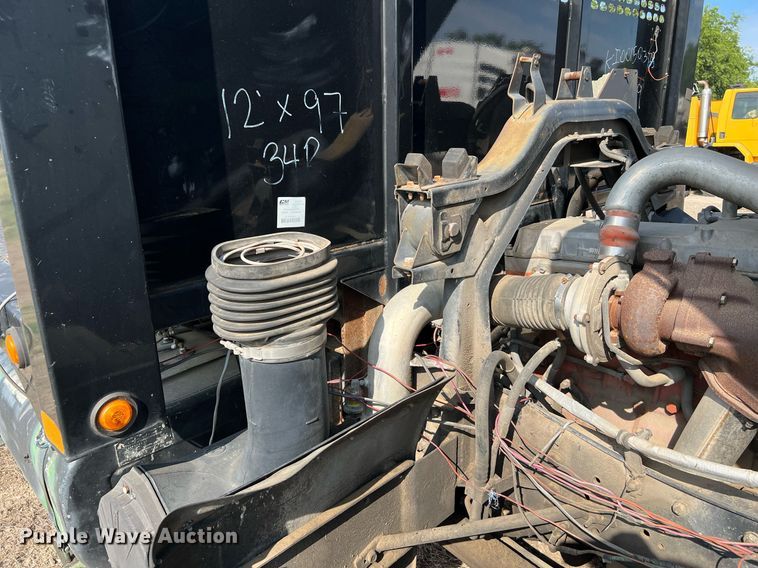 image for item DQ2085 2002 GMC T6500  flatbed truck