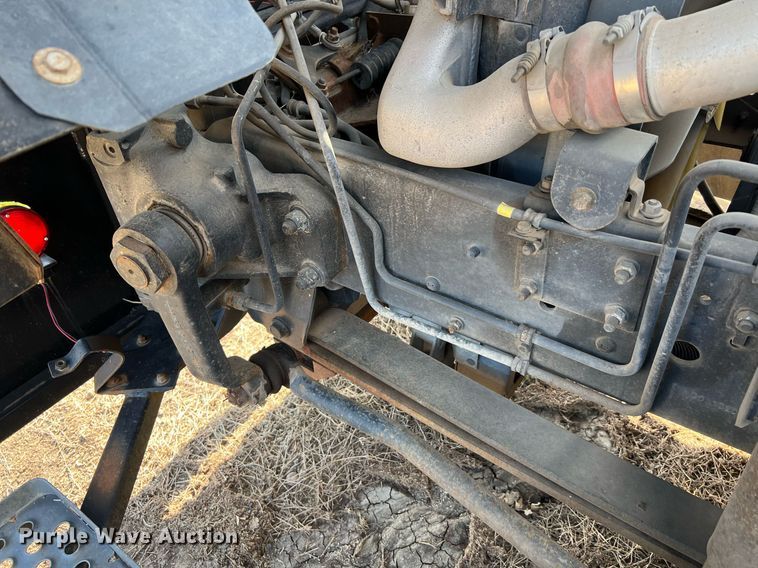 image for item DQ2085 2002 GMC T6500  flatbed truck