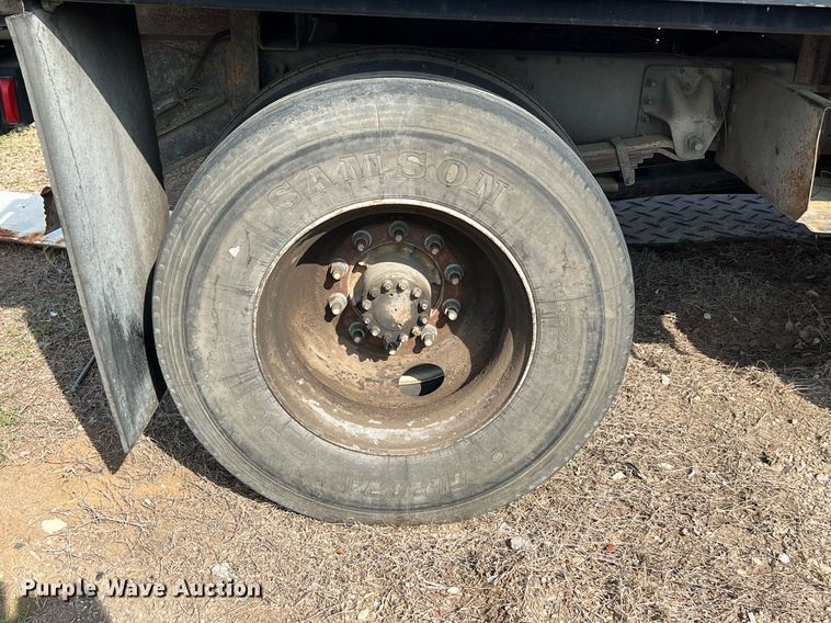 image for item DQ2085 2002 GMC T6500  flatbed truck