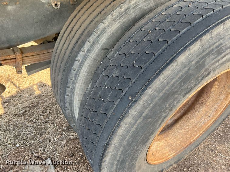 image for item DQ2085 2002 GMC T6500  flatbed truck