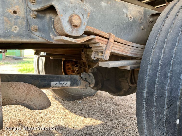 image for item DQ2085 2002 GMC T6500  flatbed truck