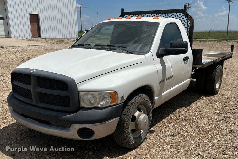 image for item KL9019 2004 Dodge Ram 3500  flatbed pickup truck