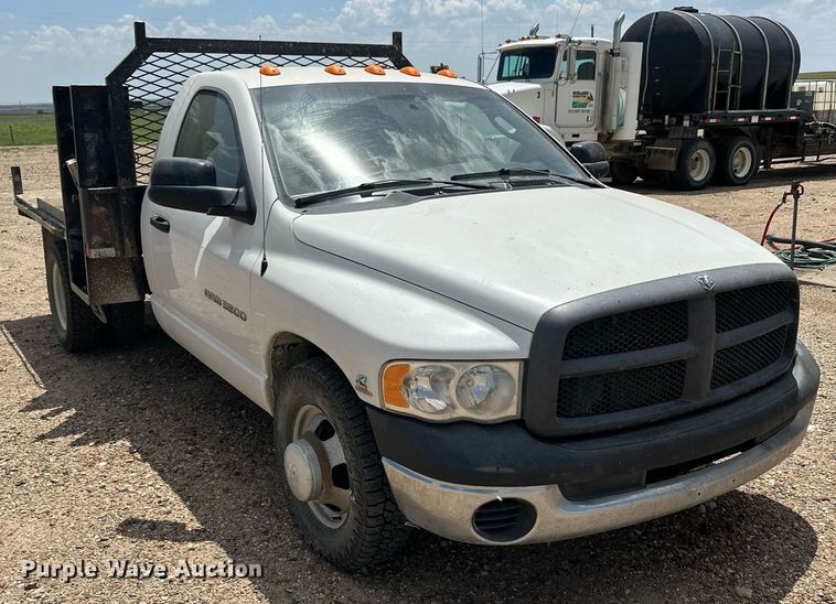 image for item KL9019 2004 Dodge Ram 3500  flatbed pickup truck