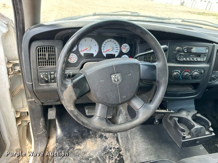 image for item KL9019 2004 Dodge Ram 3500  flatbed pickup truck