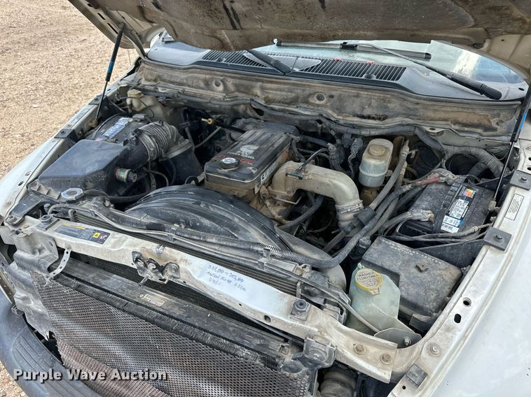 image for item KL9019 2004 Dodge Ram 3500  flatbed pickup truck