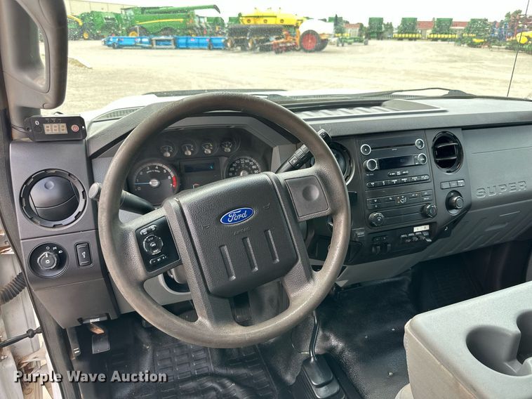 image for item KM9862 2014 Ford F350 Super Duty  utility bed pickup truck