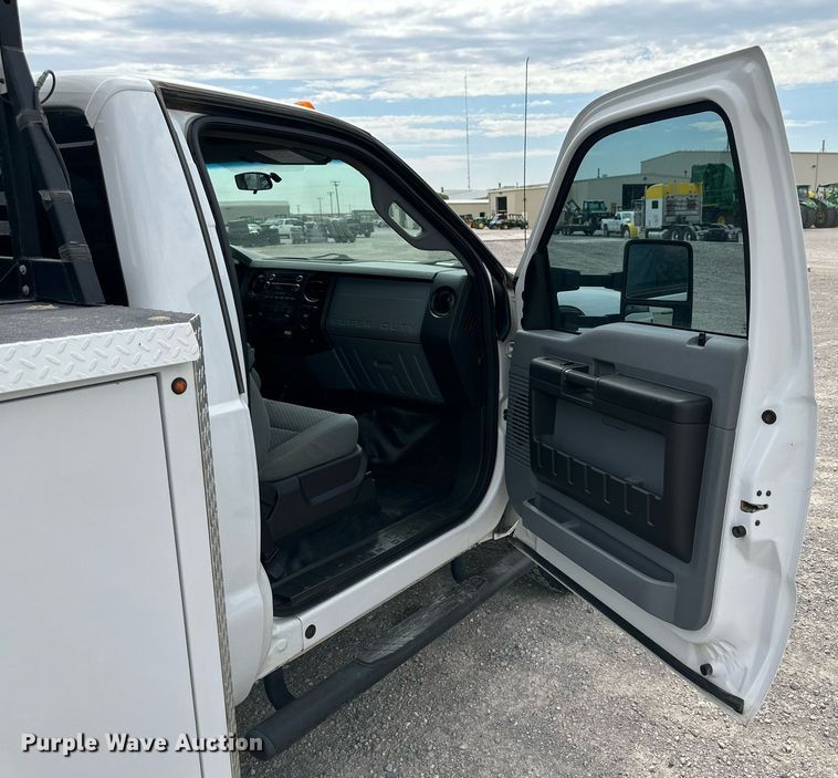 image for item KM9862 2014 Ford F350 Super Duty  utility bed pickup truck