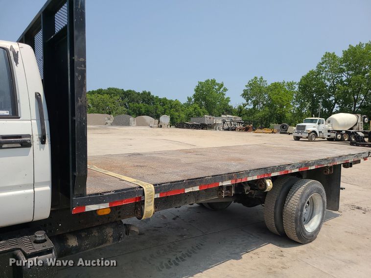 image for item LE9240 1997 GMC C5500  flatbed truck