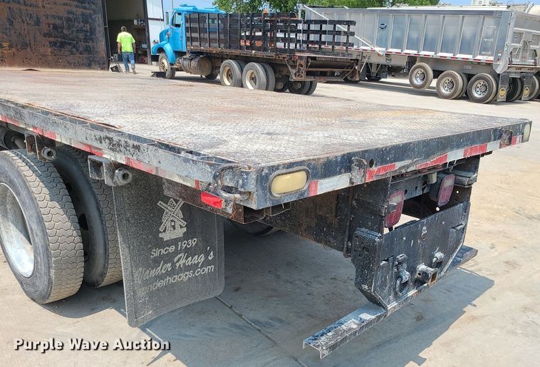 image for item LE9240 1997 GMC C5500  flatbed truck