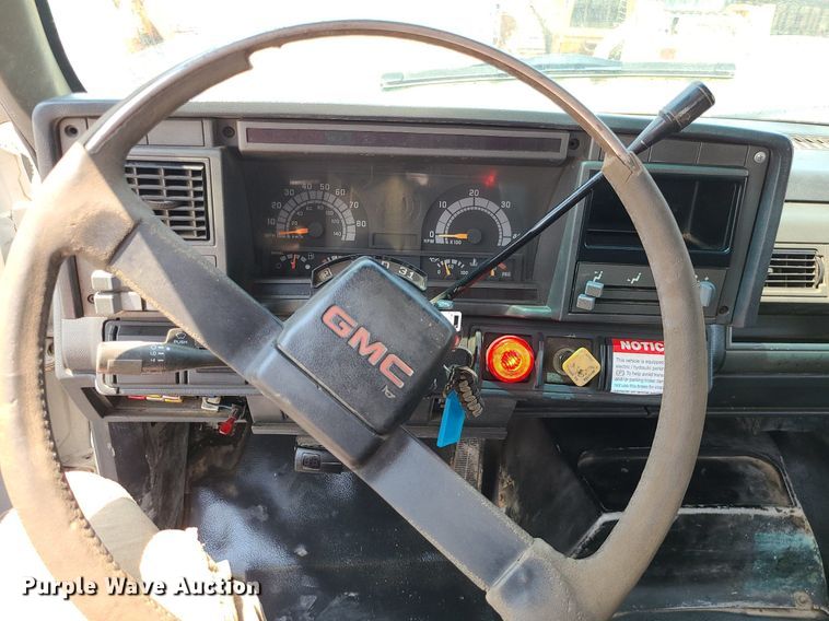 image for item LE9240 1997 GMC C5500  flatbed truck