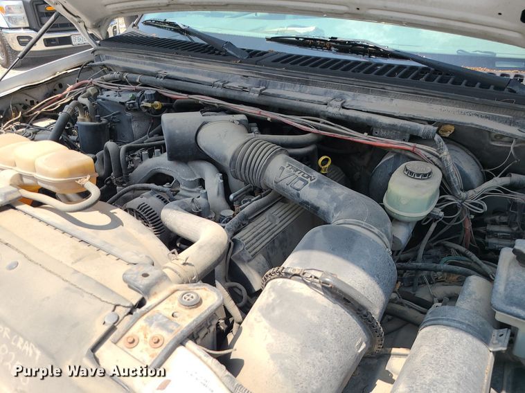 image for item LE9269 2004 Ford F350 Super Duty  SuperCab flatbed pickup truck