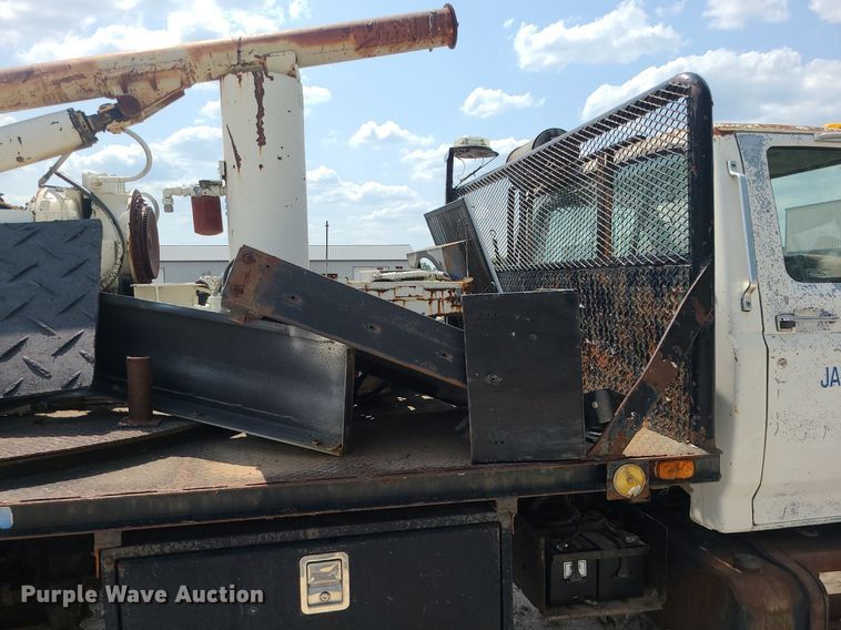 image for item LE9270 1992 Ford F700  pressure digger truck