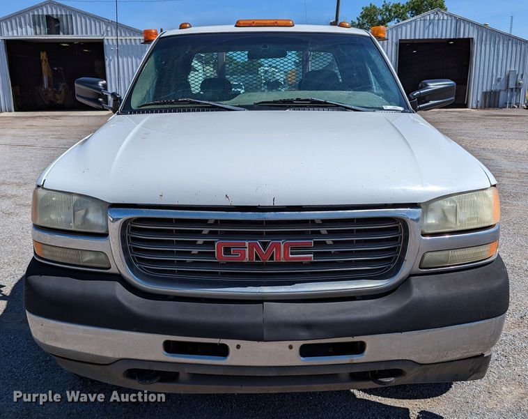 image for item LM9803 2001 GMC Sierra 3500 SL  Ext. Cab flatbed pickup truck