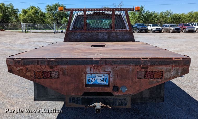 image for item LM9803 2001 GMC Sierra 3500 SL  Ext. Cab flatbed pickup truck