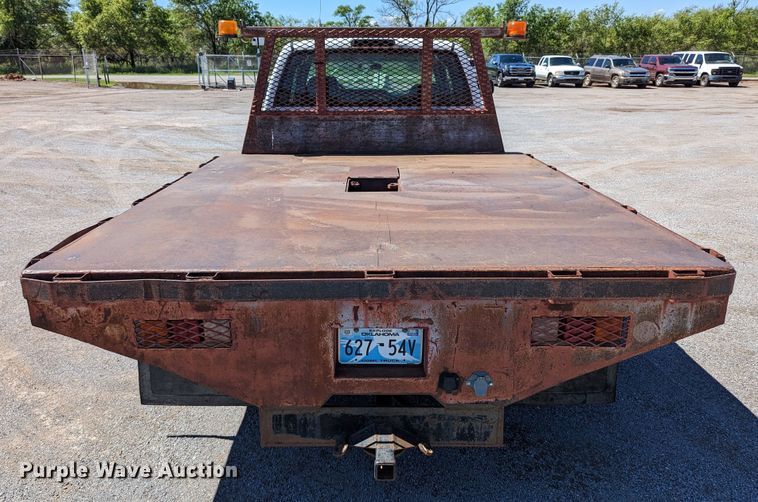 image for item LM9803 2001 GMC Sierra 3500 SL  Ext. Cab flatbed pickup truck