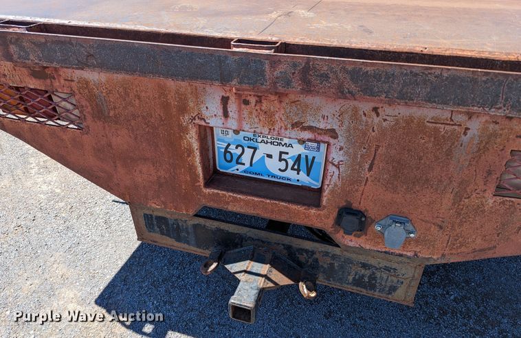 image for item LM9803 2001 GMC Sierra 3500 SL  Ext. Cab flatbed pickup truck