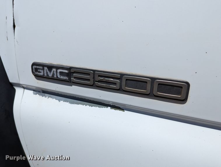 image for item LM9803 2001 GMC Sierra 3500 SL  Ext. Cab flatbed pickup truck